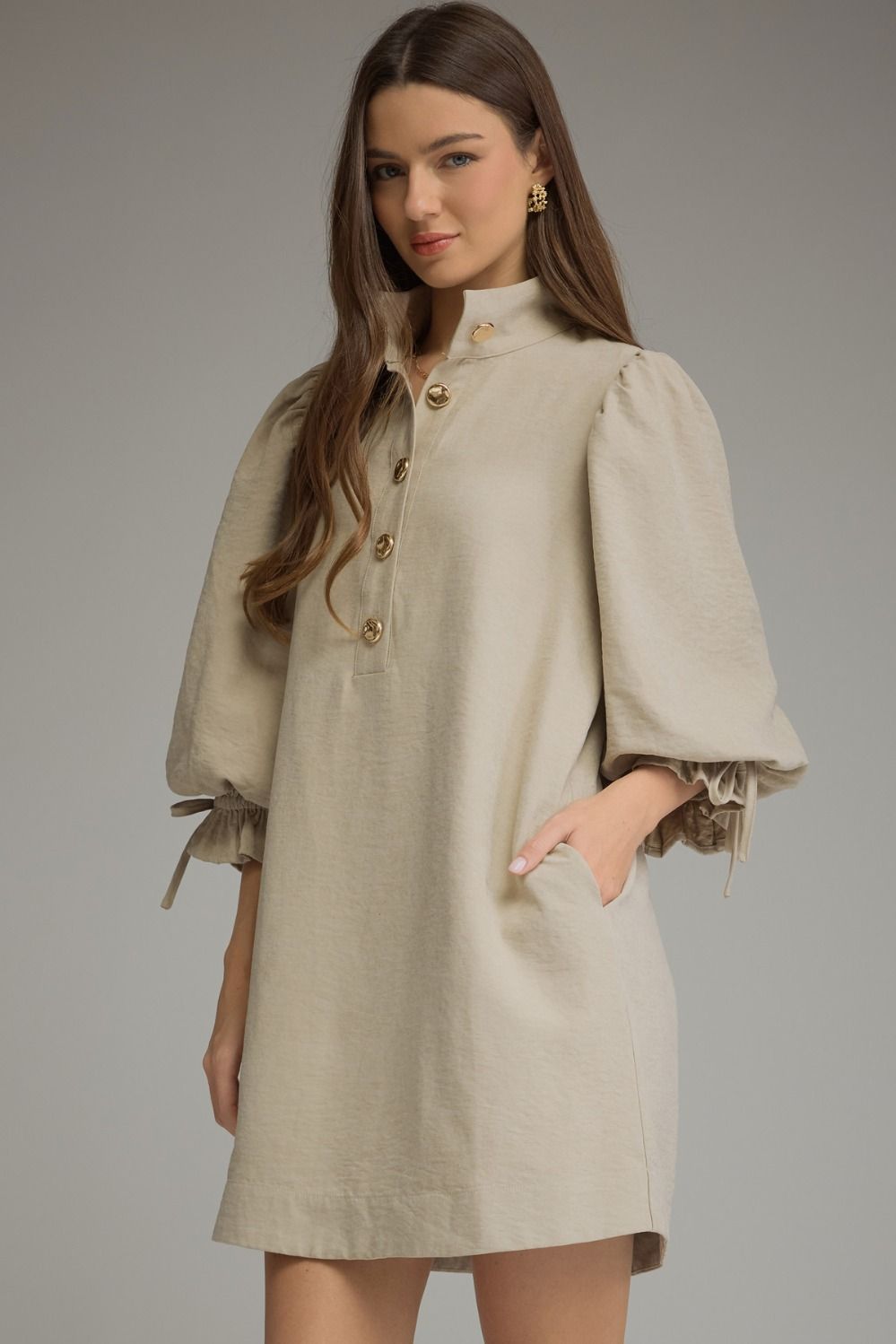 Taupe mini dress with gold buttons front view